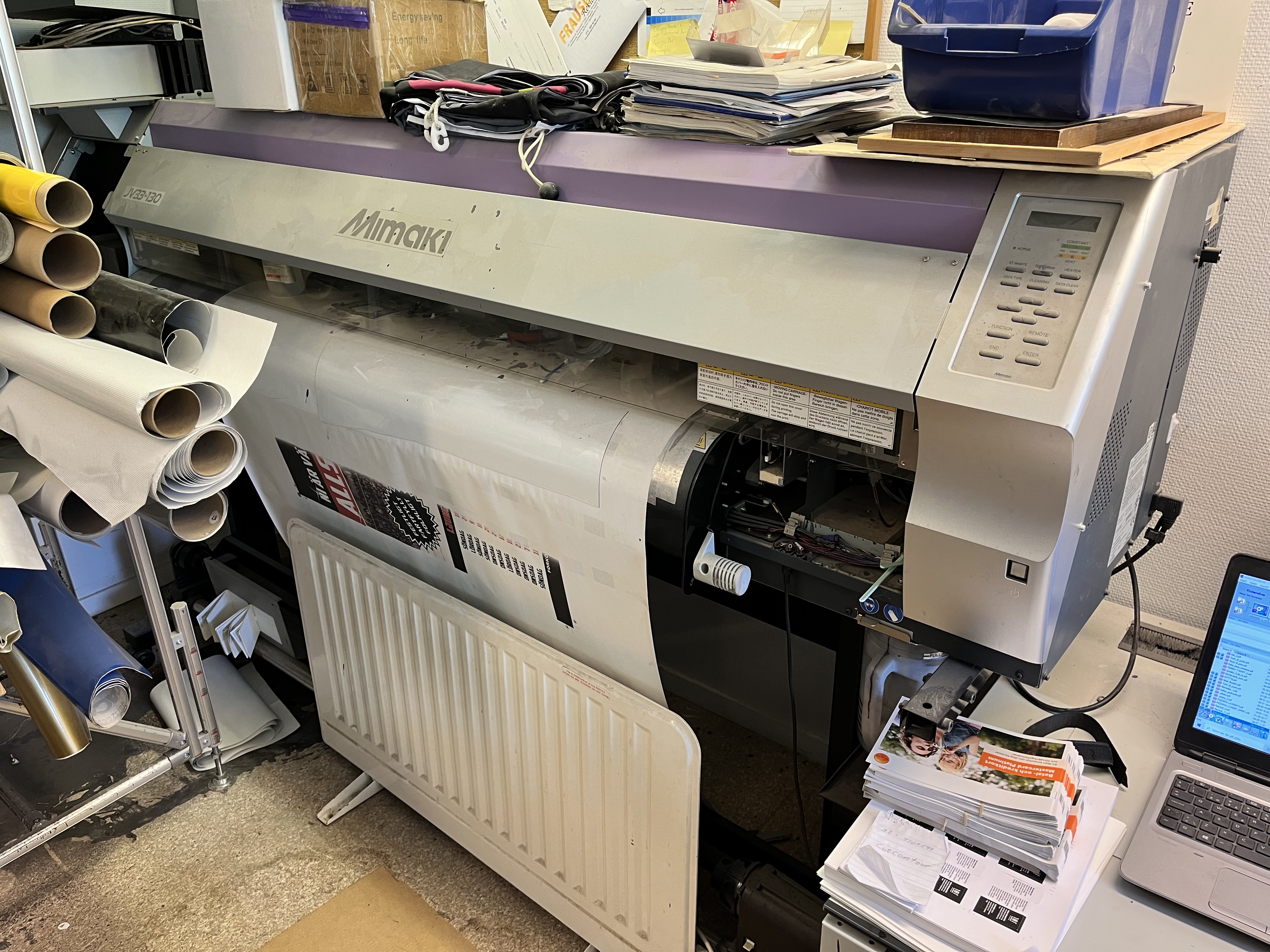 Mimaki printer producing posters and banners in a combined run